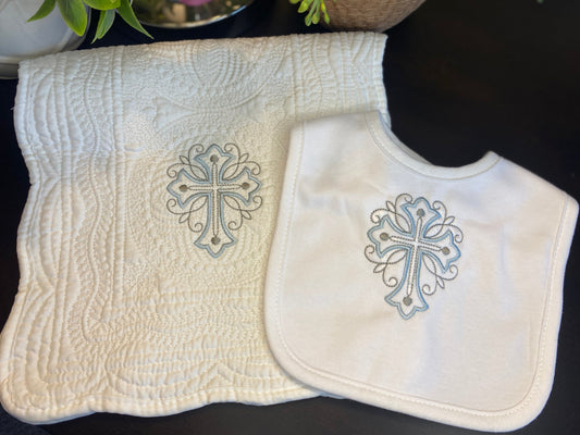 Personalized Scrollwork Cross Baptism Gift Set | Custom Quilt Bib & Burp Cloth Christening Heirloom featuring embroidered scrollwork cross on soft white fabric.
