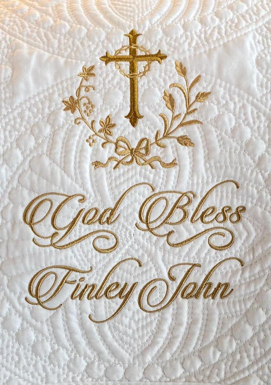 Personalized Embroidered Baptism Baby Quilt | Custom Cross Christening Blanket | Religious Keepsake featuring gold embroidered cross, floral design, and "God Bless Finley John" text on white quilt.