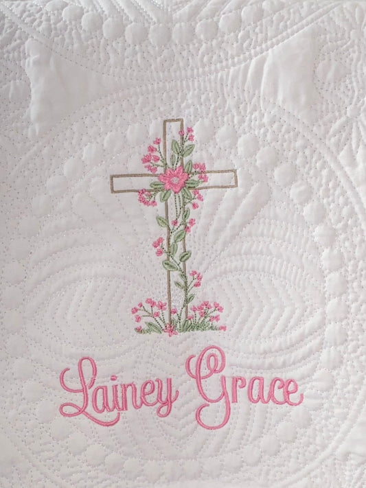 Personalized Heart & Vine Cross Baptism Baby Quilt | Custom Name Christening Heirloom Blanket for Girls featuring an embroidered cross with pink flowers and custom name in delicate script.