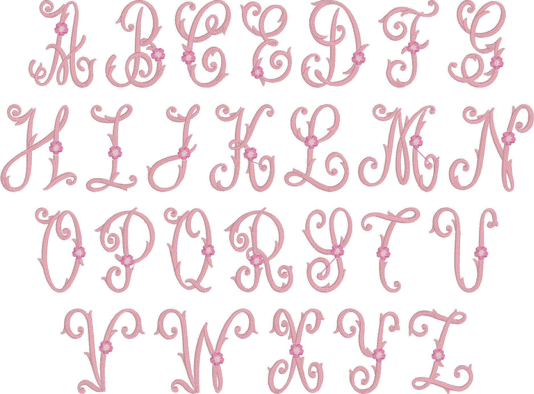 Set of pink embroidered monogram letters with floral accents for personalized designs on the Personalized Vintage Satin Monogram Baby Quilt | Custom Embroidered Heirloom Blanket.