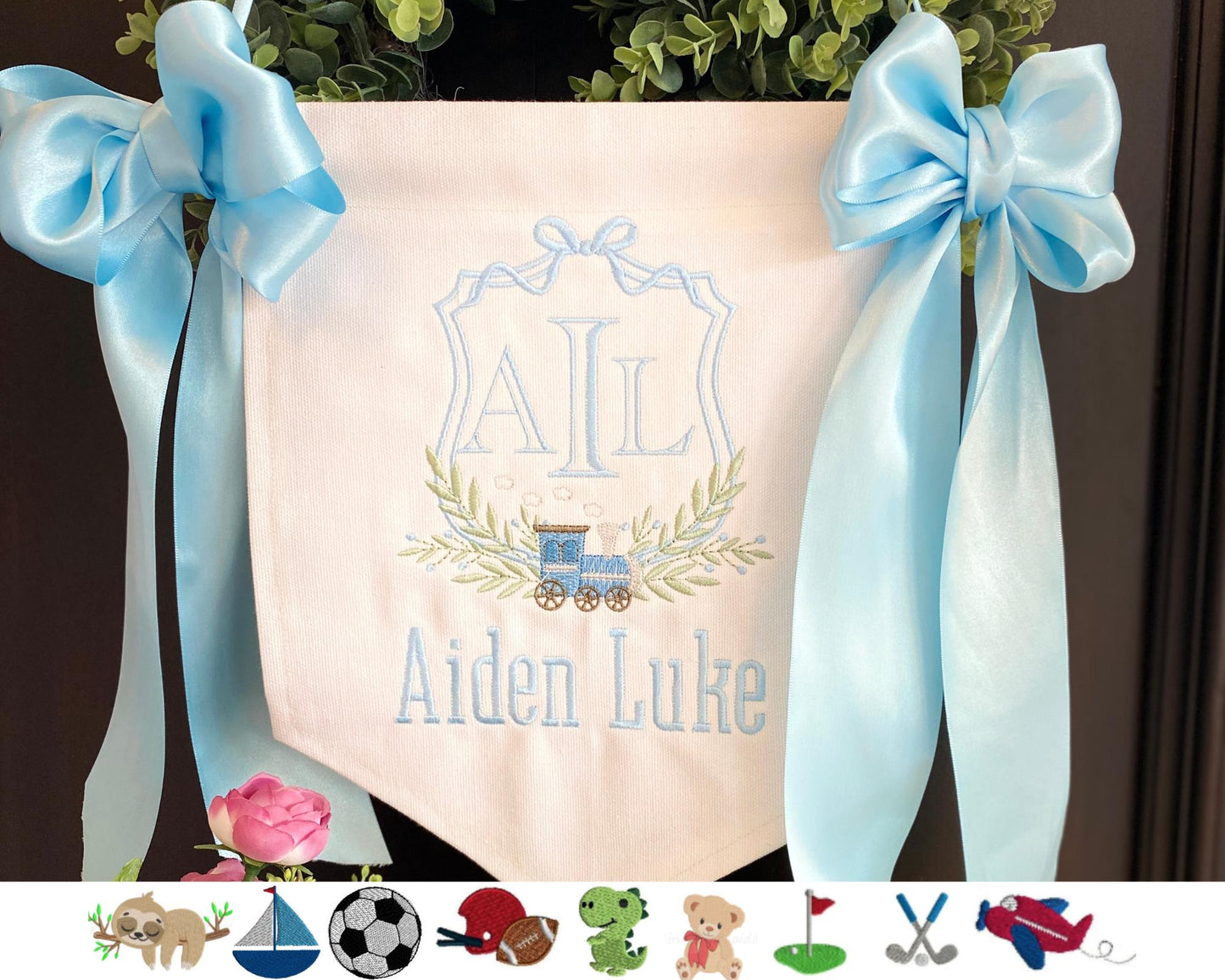 Personalized Embroidered Baby Birth Announcement Banner | Hospital Door Sign | Choose Your Design featuring a monogram with initials, delicate floral embroidery, and baby blue ribbons.