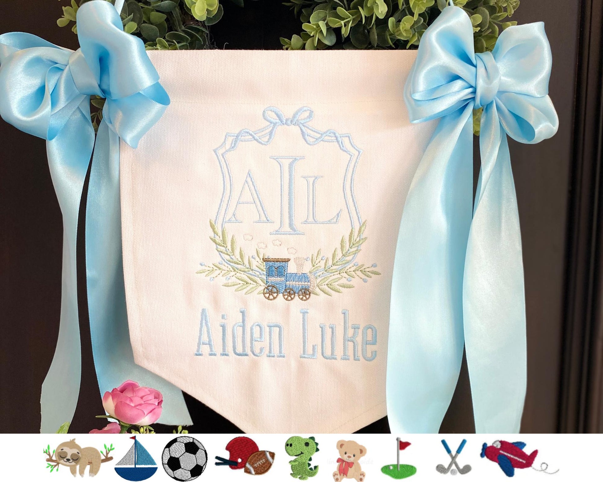Personalized Embroidered Baby Birth Announcement Banner | Hospital Door Sign | Choose Your Design featuring a monogram with initials, delicate floral embroidery, and baby blue ribbons.